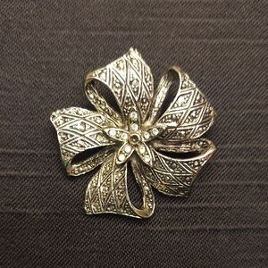 Intricate Silver Floral Brooch
